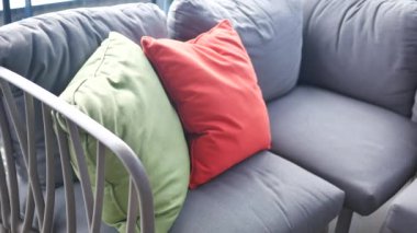 modern grey sofa with pillows in living room at home. High quality photo
