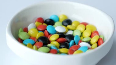 hand pick colorful sweet candy ,
