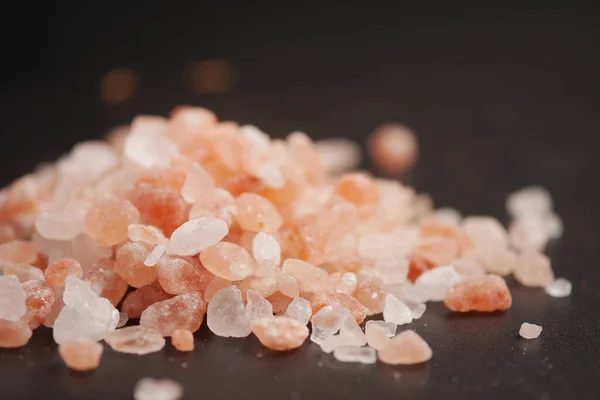 Raw dried pink Himalayan salt .