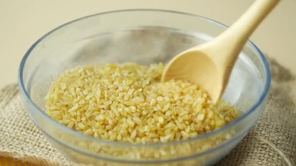 Raw Bulgur Rice Bowl — Stock Video
