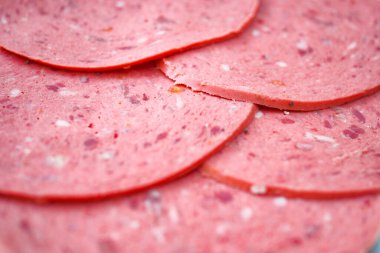 salami sausage cut into thin pieces .
