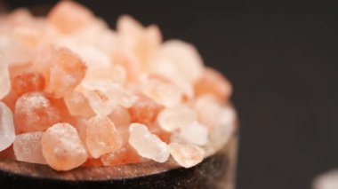 Raw dried pink Himalayan salt .