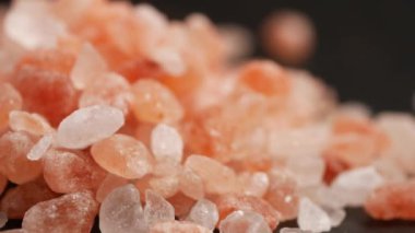 Raw dried pink Himalayan salt .