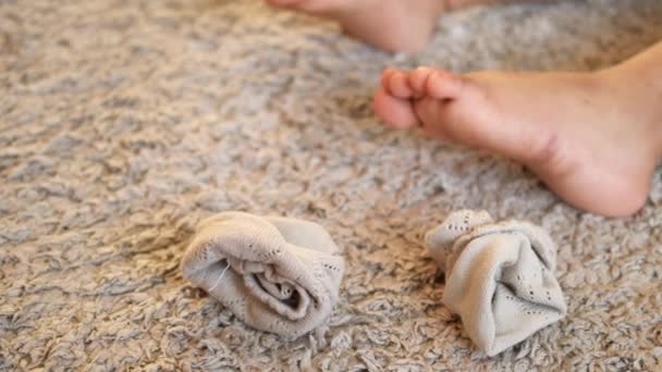 Child Dirty Sock Feet Carpet — Stock Video
