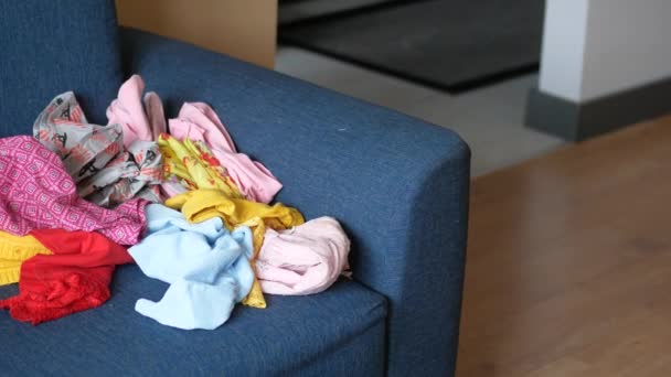 Messy Clothes Sofa — Vídeo de stock