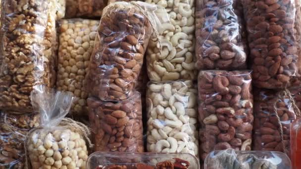 Many Mixed Nuts Plastic Packet Shelf High Quality Photo — Stock Video
