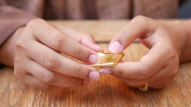 removing packet from a chocolate .