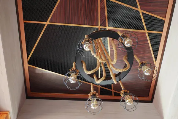 Vintage rope chandelier light on the wall ,