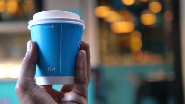 Pov Holding Blue Color Takeaway Coffee Cup — Stock Video