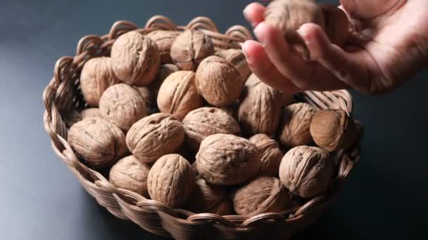 Woman Hand Pick Walnuts Table — Stock Video