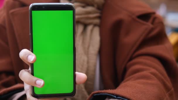 Close Young Woman Hand Showing Smart Phone Green Screen — Stock Video