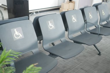 Disabled place at the airport, with space for text clipart