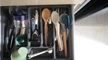 cutlery fork with knife and spoon in a drawer ,