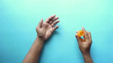 young men taking medical pill .