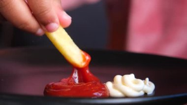 detail shot of French Fries on table .