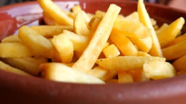 detail shot of French Fries on table .