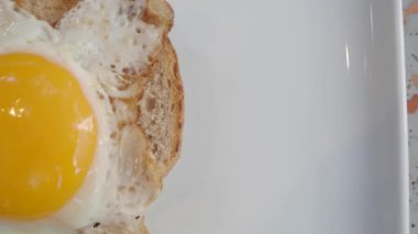 Fried eggs in the plate close up ,,