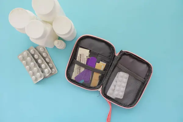 stock image adhesive bandage and a bag on table ,