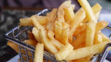 detail shot of French Fries on table .