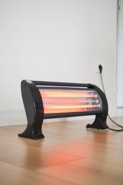 Modern elektrikli kızılötesi ısıtıcı oturma odasında, yakın çekim. Yüksek kalite fotoğraf