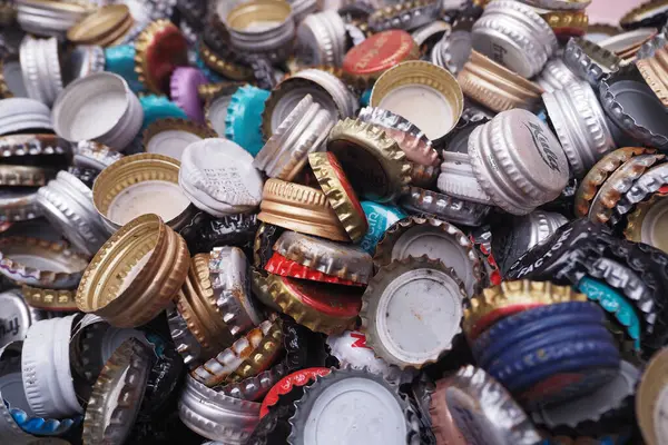 stock image High-resolution image of various colorful bottle caps. Ideal for beverage or recycling themes.