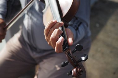  men playing traditional music instrument turkish saz . clipart