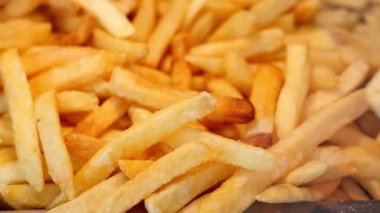 detail shot of French Fries on table .