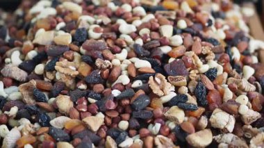 A colorful assortment of nuts and dried fruits ready to enjoy.