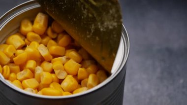 Watch how to open a can of corn for quick cooking at home.
