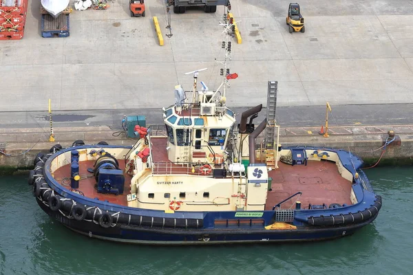 stock image Tug boat Svitzer Harty is pictured in the port of Southampton, England.  Svitzer Harty was built in 2006 and Svitzer is a company offering towage and marine solutions.