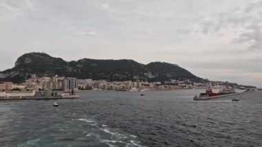 A time-lapse recording taken from a ship as it departs Gibraltar.  Gibraltar is a British overseas territory located at the tip of southern Spain.