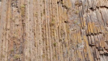 Panning view symphony of stones pattern and texture in garni gorge, Armenia . Famous landmark and caucasus travel destination