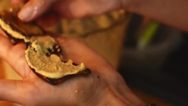 Close Macro Woman Hands Roll Eggplants Walnuts Spread Put Plastic — Stockvideo
