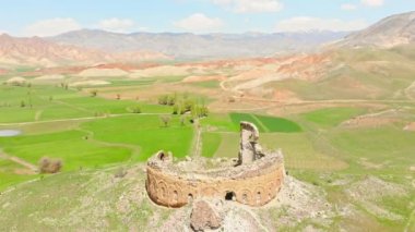Aerial top descending view scenic round Bana cathedral wall ruins . Famous georgian landmark in Turkey