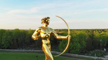 Siauliai, Lithuania - 2nd June, 2021: Aerial view statue of Golden boy in Siauliai, Lithuania, Europe travel destination.