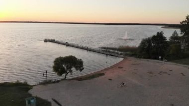 Aerial static view Rekyva lake in Siauliai countryside. Leisure activities and summer holiday destination. Biggest lakes in Lithuania