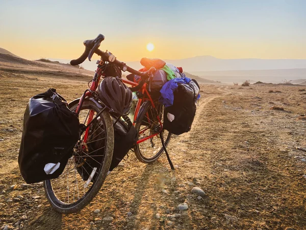 Loaded Bags Red Bicycle Stands Side Road Surrounded Mountains Countryside — 스톡 사진