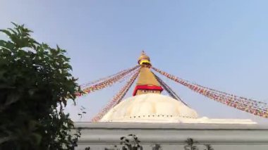 Katmandu, Nepal - 15 Kasım 2023: Günbatımı manzarasında hiper sapma dairesel görüş Bouddha veya Boudhanath. Katmandu, Nepal 'deki ilk stupa. Popüler seyahat hedefi