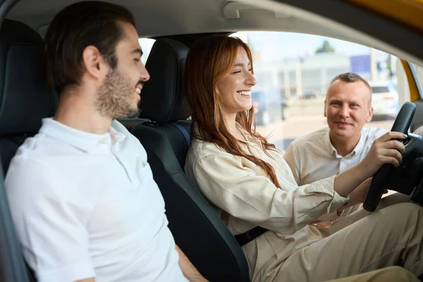 Smiling Woman Man Sitting Car Presence Sales Consultant — Stock Photo, Image