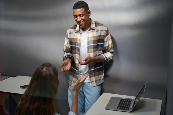 Smiling African American Guy Explaining His Female Colleague Office — Stock Photo, Image