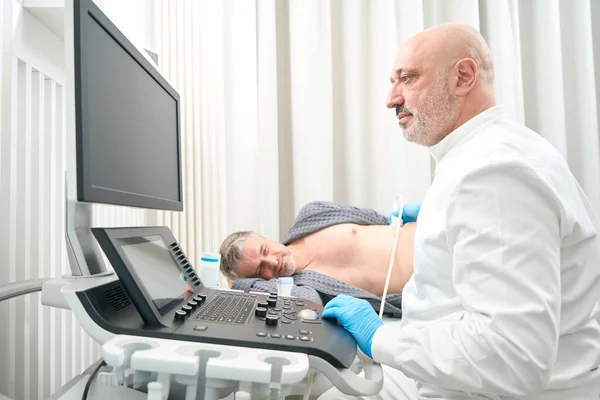 Close Side View Portrait Concentrated Man Doctor Doing Ultrasound Check — Stock Photo, Image