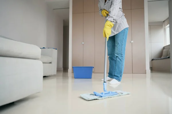 Woman Protective Gloves Washes Floor Bright Living Room Comfortable Furniture — 图库照片