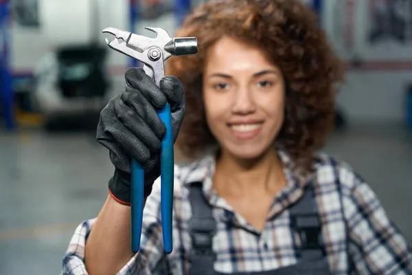 Smiling Curly Multiracial Woman Holding Adjustable Wrench Repairwoman Plaid Shirt — Stock Photo, Image