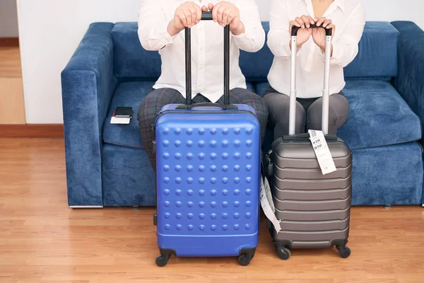 Cropped Photo Tourist Couple Trolley Suitcases Sitting Comfortable Sofa — Stock Photo, Image