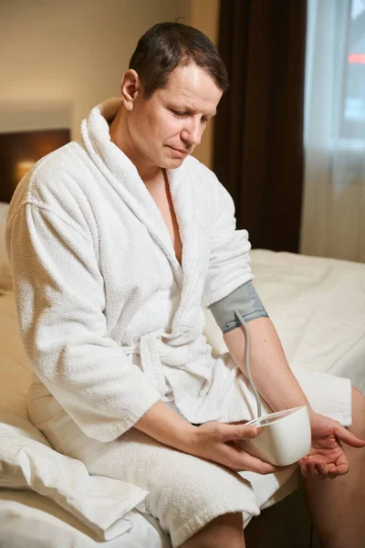 Sad Man Bathrobe Measures Blood Pressure Tonometer Male Sitting Large — Stock Photo, Image