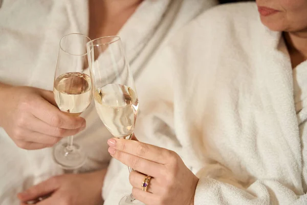 Couple Bathrobes Enjoying Champagne Tall Glasses Woman Has Ring Her — Stock Photo, Image