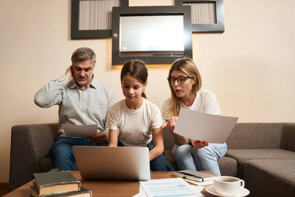 Nice Girl Using Laptop While Her Mother Talking Her Father — Stock Photo, Image