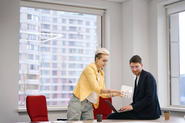 Woman Showing Male Colleague Paper Layout House Real Estate Agency — Stock Photo, Image