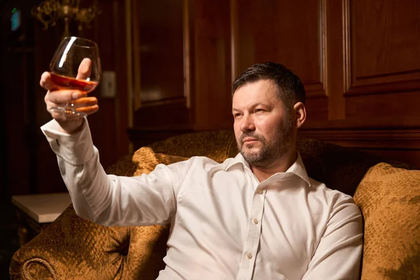 Serious Businessman Trying New Cognac While Chilling Luxury Couch Restaurant — Stock Photo, Image