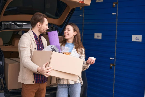 Smiling Woman Man Packing Things Move Trunk Car Warehouse — Stock Photo, Image